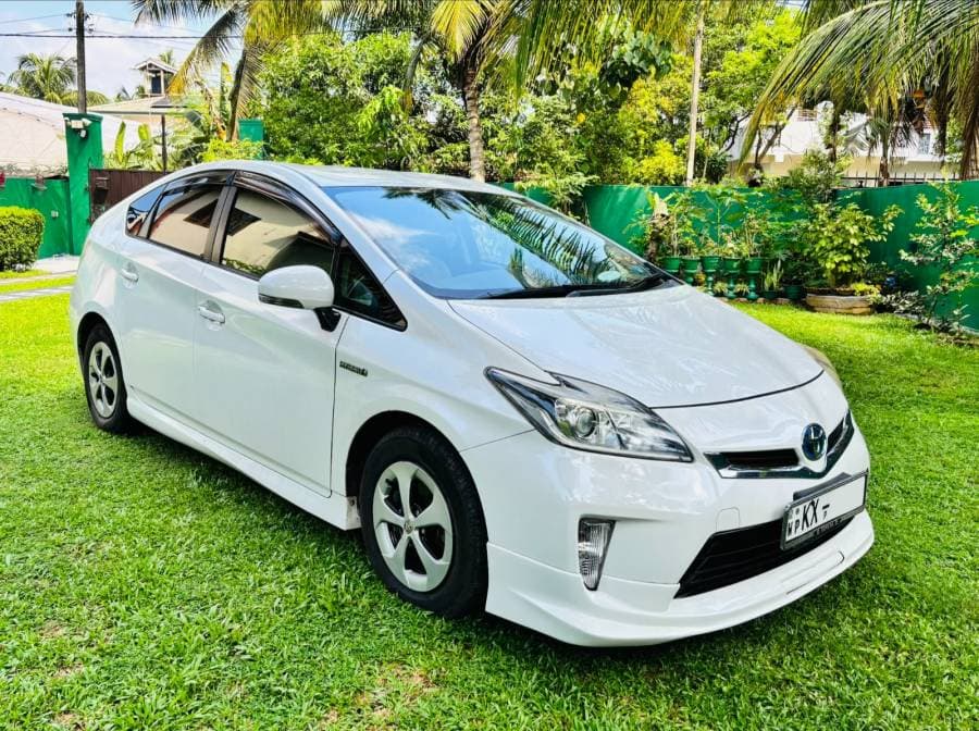 A row of private vehicles available for hire in Sri Lanka